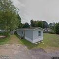 Two people in physical fight at trailer park