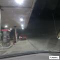 Traffic stop on dark gray Kia at Speedway lot