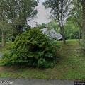 Tree blocking roadway on Manor Lane