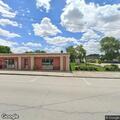 Person experiencing chest pain at public library