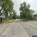 Tree knocks down utility pole and power lines
