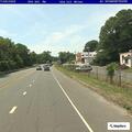 Muffler blocking roadway near gas station