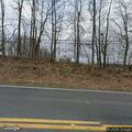 Car hits deer causing property damage