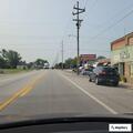 Driver passes cars and ignores stop at four-way