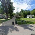 Delivery truck backs over landscaping mower