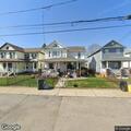 Man with chest pain and shortness of breath outside home