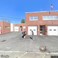 Engine stands by at firehouse for structure fire