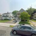 Vehicle partially blocking driveway on Seymour Ave