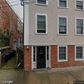 Car blocking driveway and garage on Gold Street