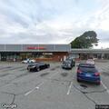 Police check running vehicle in parking lot