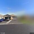 Person experiencing chest pain at home in Beecher