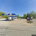 Disabled vehicle owner walking to get gas