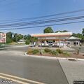 Vehicle leaking fluid at gas station