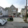 Car blocking driveway on William Street