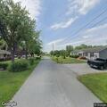 Officer stops gray Honda Odyssey in alley