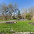 Truck catches support cable on North Meadow Park