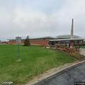 Person experiencing chest pain at service plaza