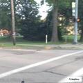Erratic gray SUV speeding on Valley Parkway