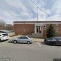 Woman with head pain after car crash at police station