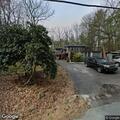 Person experiencing difficulty breathing on Shiny Mountain Road