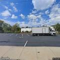 Parking lot crash with one person reporting neck pain