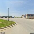 Unoccupied SUV left running at gas station