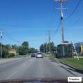 Teen girl lying in road on Ridge Road in Parma