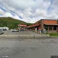 Person experiencing dizziness at gas station on Route 14