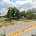 Traffic stop and road closure at railroad tracks