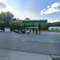 Deer removed from roadway near gas station