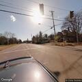 Person slumped over wheel of truck in Bristolville