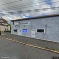 Vehicle crash injures one and damages two buildings
