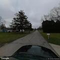 Female with foot injury walks at intersection