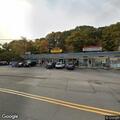 Crash with injuries at Amigos Deli on West Street