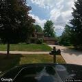 Officer serving summons on Bunker Hill Drive