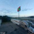 Woman having trouble breathing at gas station