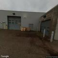Tow truck hits parked car at service department