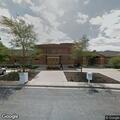 Person having a seizure in car at police department lot