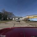 Improper tree pile burning between house and garage