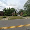 Resident reports unknown car parked in driveway