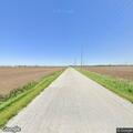 Downed power lines blocking rural roadway