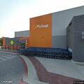 Traffic stop on orange sports bike at Walmart