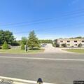 Smoke reported from roof of building on Frontage Rd