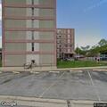 Fire alarm sounding in apartment building lobby