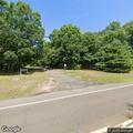 Officer checks vehicles at Rockland Preserve lot