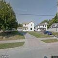 Suspicious person digging through trash on Oak Street