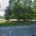 Person leaves apartment at Brookside Condominium