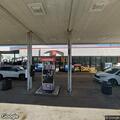 Officers check vehicle parked long time at gas pump