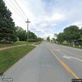 Traffic lights flashing red at busy intersection