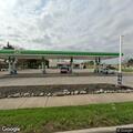 Suspicious people in white sedan at gas station